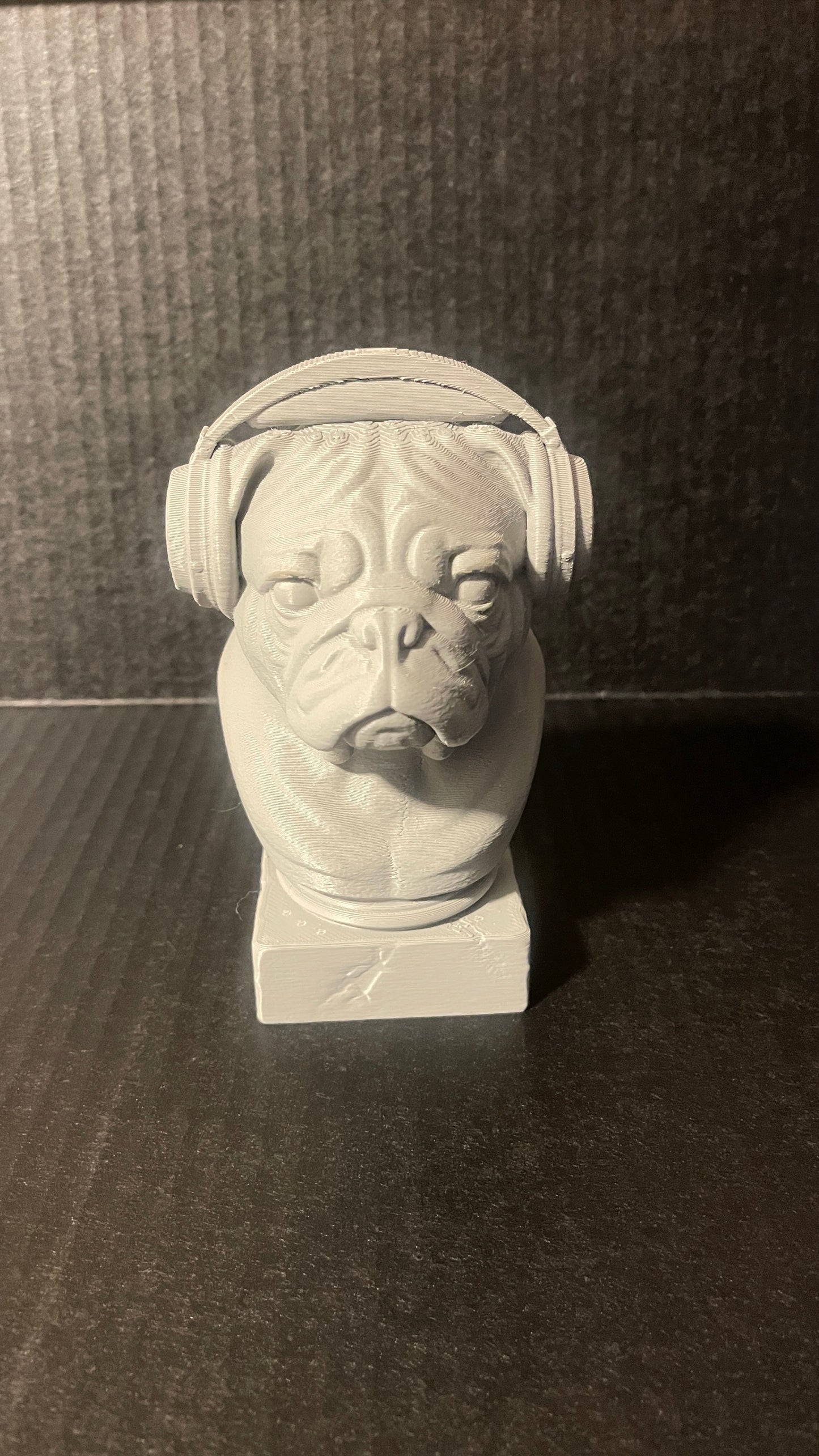 3D printed bulldog wearing headphones