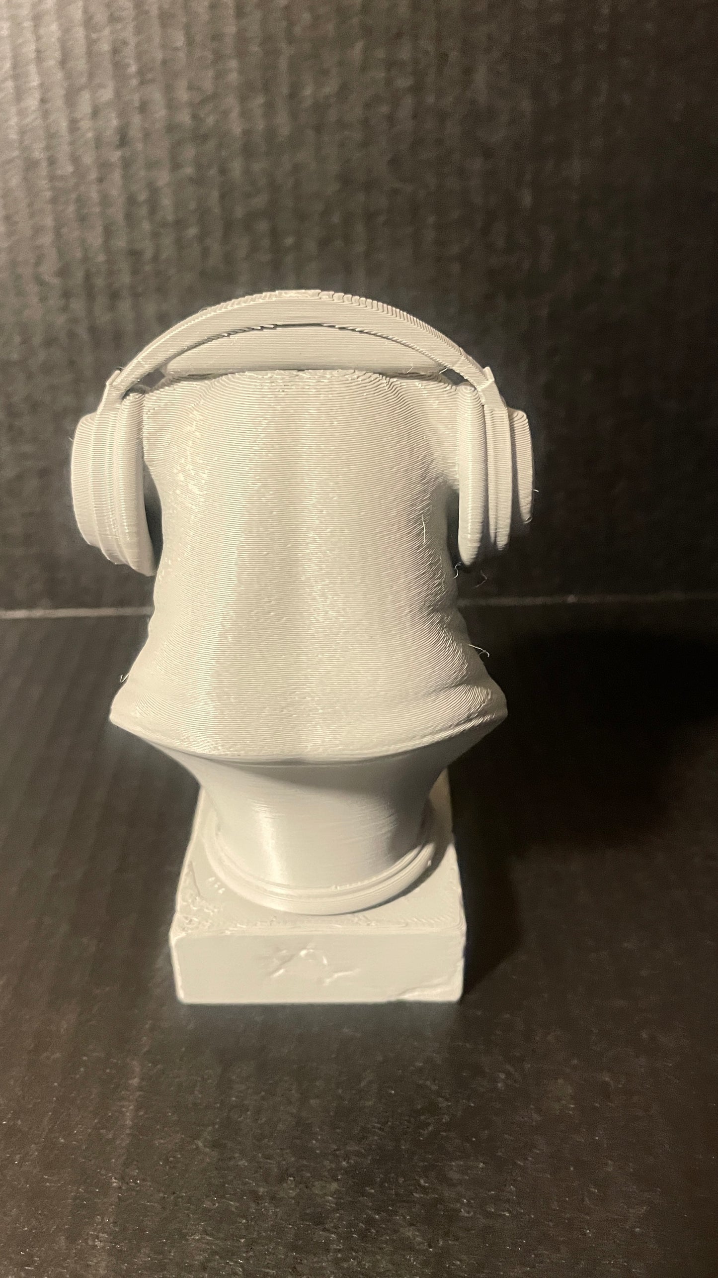 3D printed bulldog wearing headphones