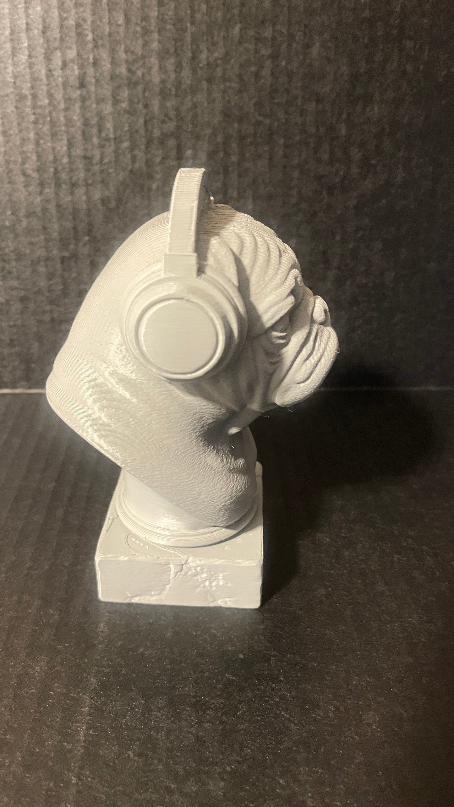 3D printed bulldog wearing headphones